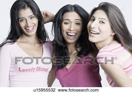 Portrait of three young women smiling View Large Photo Image Stock Image - Portrait of three young women smiling. Fotosearch
