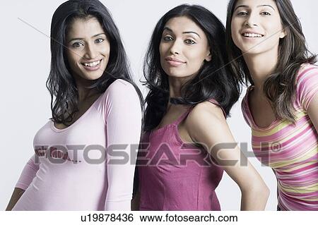 Portrait of three young women smiling View Large Photo Image Stock Photograph - Portrait of three young women smiling. Fotosearch