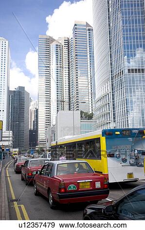 Cars in traffic, Central District, Hong Kong View Large Photo Image Stock Photo - Cars in traffic, Central District, Hong Kong. Fotosearch
