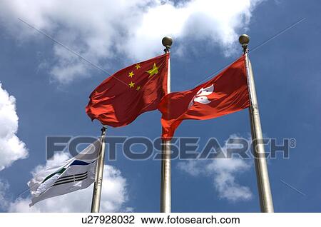 Chinese and Hong Kong flags at the Hong Kong Convention and Exhibition Centre, Wan Chai, Hong Kong View Large Photo Image Stock Image - Chinese and Hong Kong flags at the Hong Kong Convention and Exhibition Centre, Wan Chai, Hong Kong. Fotosearch