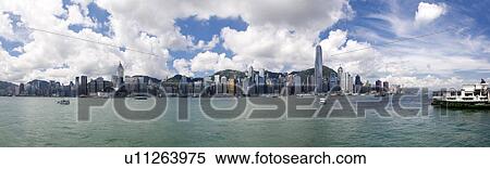 Stock Photography - Daytime cityscape and Victoria Harbor, Hong Kong. Fotosearch