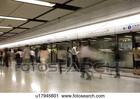 People taking the MTR, or Mass Transit Railway, Hong Kong View Large Photo Image Stock Image - People taking the MTR, or Mass Transit Railway, Hong Kong. Fotosearch