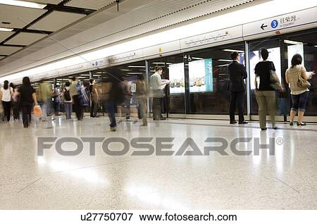 People using the MTR, or the Mass Transit Railway, Hong Kong View Large Photo Image Stock Photo - People using the MTR, or the Mass Transit Railway, Hong Kong. Fotosearch