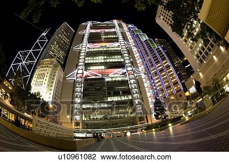 Stock Image - Statue Square at night in Central, Hong Kong, fisheye lens. Fotosearch