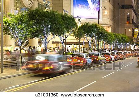 Taxies lining up beside Times Square in Causeway Bay (Tung Lo Wan), Hong Kong View Large Photo Image Stock Image - Taxies lining up beside Times Square in Causeway Bay (Tung Lo Wan), Hong Kong. Fotosearch