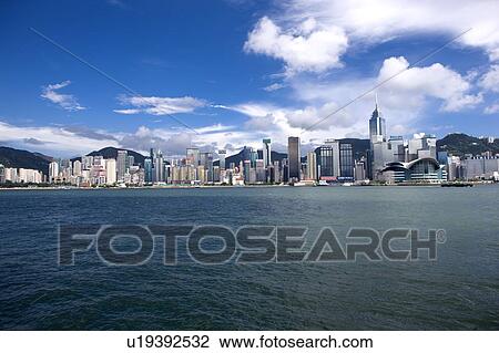 Stock Image - Victoria Harbor cityscape during the day, Hong Kong. Fotosearch