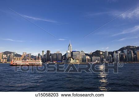 Stock Image - Victoria Harbor during the day, Hong Kong. Fotosearch