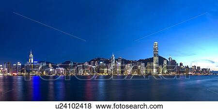 Stock Photo - View of Victoria Harbor at night, Hong Kong. Fotosearch