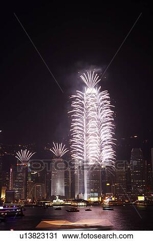 Stock Image - 2007 New Years Eve Fireworks Celebration, Hong Kong, Hong Kong Island skyline at night. Fotosearch