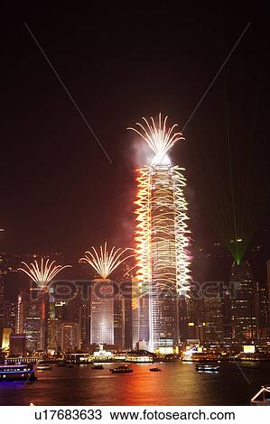 Stock Image - 2007 New Years Eve Fireworks Celebration, Hong Kong, Hong Kong Island skyline at night. Fotosearch