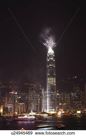 Stock Photo - 2007 New Years Eve Fireworks Celebration, Hong Kong, Hong Kong Island skyline at night. Fotosearch
