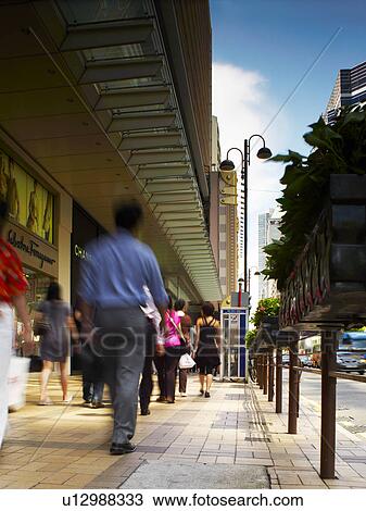 Stock Image - Canton Road, Tsim Sha Tsui, Kowloon, Hong Kong, Pedestrian Shopping Street. Fotosearch