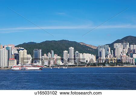 Stock Image - China, Hong Kong, Cruise Ship in Hong Kong Harbour. Fotosearch