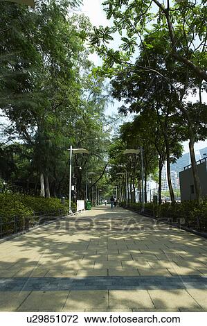 Stock Image - Footpath, Victoria Park, Causeway Bay, Hong Kong. Fotosearch