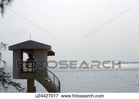Stock Photo - Life guard's tower on Golden Beach, Gold Coast, Castle Peak Bay, Hong Kong. Fotosearch