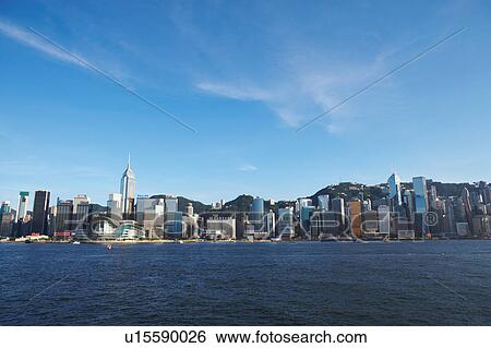 Stock Photograph - Skyline of Hong Kong Island from Kowloon, Hong Kong, China. Fotosearch