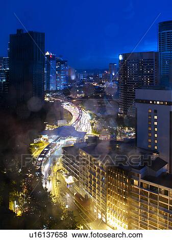 Malaysia, Kuala Lumpur, Cityscape through window View Large Photo Image Stock Photo - Malaysia, Kuala Lumpur, Cityscape through window. Fotosearch