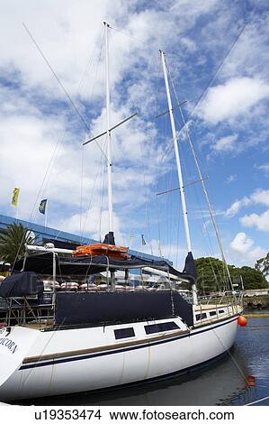 Picture - Yactch anchored at the pier. Fotosearch