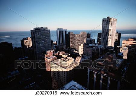 Stock Photograph - Skyline In Sunset. Fotosearch