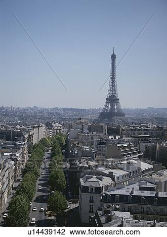 Stock Image - The Eiffel Tower And Rows Of Houses In Paris, France. Fotosearch