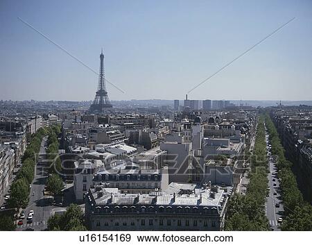 Stock Photo - The Eiffel Tower And Rows Of Houses In Paris, France. Fotosearch