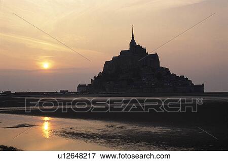 The Morning Sun And Mont-Saint-Michel In France View Large Photo Image Stock Photo - The Morning Sun And Mont-Saint-Michel In France. Fotosearch