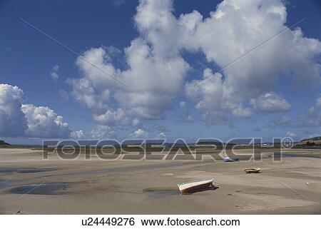 Stock Photograph - A Boat, The Sky, And Theclouds. Fotosearch