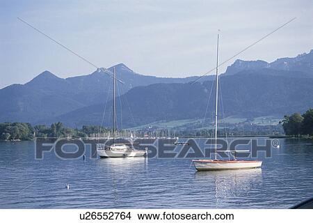 Picture - A Lake And A Sailboat. Fotosearch
