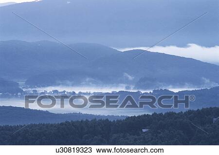Stock Image - A Misty Town. Fotosearch