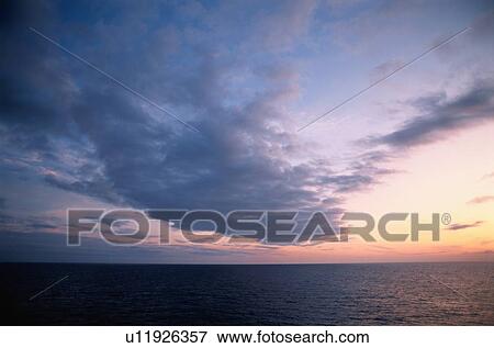 Stock Photo - Clouds Above Sea. Fotosearch
