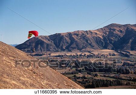 Stock Photography - Paraglider And Mountains. Fotosearch