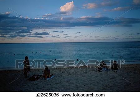 Stock Photograph - People On Beach. Fotosearch