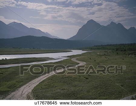 The Winding River And Mountain Range Canada View Large Photo Image Stock Photography - The Winding River And Mountain Range Canada. Fotosearch