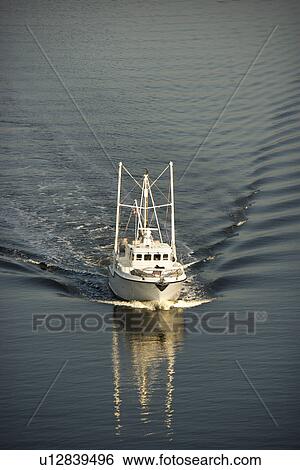 Aerial view of trawler fishing boat at sea. View Large Photo Image Stock Photograph - Aerial view of trawler fishing boat at sea.. Fotosearch