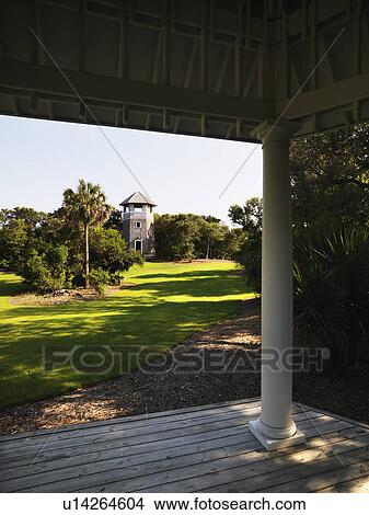 Lookout tower at park from covered porch at Bald Head Island, North Carolina. View Large Photo Image Picture - Lookout tower at park from covered porch at Bald Head Island, North Carolina.. Fotosearch