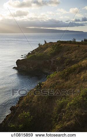 Stock Photo - Pacific ocean with coastal cliff.. Fotosearch