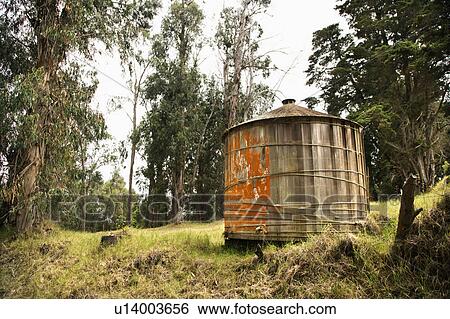 Round rustic storage structure with peeling orange paint. View Large Photo Image Stock Photograph - Round rustic storage structure with peeling orange paint.. Fotosearch