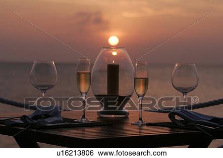 A Candle And A Champagne Glass View Large Photo Image Stock Photograph - A Candle And A Champagne Glass. Fotosearch