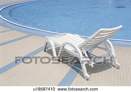 Stock Image - The Beach Chair At The Poolside. Fotosearch