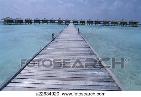 Stock Image - The Bridge To The Cottage. Fotosearch