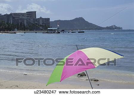 Stock Photo - The Sky And A Beach Umbrella. Fotosearch