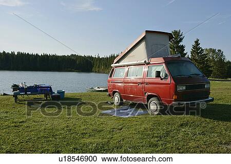 Stock Image - Camper at etang-a-la-Truite (Trout pond), Gaspesie, Quebec. Fotosearch