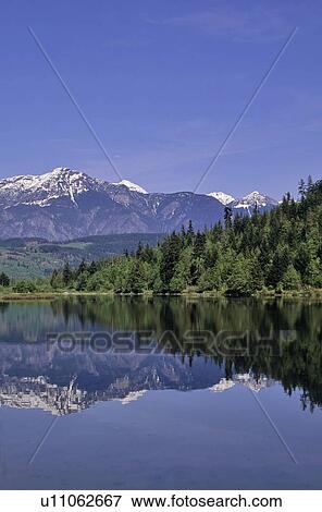 One Mile Lake, near Pemberton, BC with Cayoosh Range behind View Large Photo Image Stock Photo - One Mile Lake, near Pemberton, BC with Cayoosh Range behind. Fotosearch