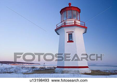 View of Cap Blanc lighthouse and Île Bonaventure at sunset, Quebec View Large Photo Image Stock Image - View of Cap Blanc lighthouse and Île Bonaventure at sunset, Quebec. Fotosearch