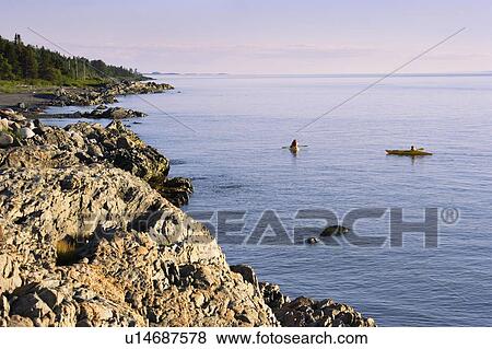 View of kayak on St. Lawrence River, Bas-Saint-Laurent region, Quebec, Canada View Large Photo Image Stock Photo - View of kayak on St. Lawrence River, Bas-Saint-Laurent region, Quebec, Canada. Fotosearch