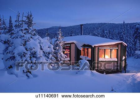 View of La Mesange shelter and snow-covered trees at twilight, Quebec, Canada View Large Photo Image Stock Image - View of La Mesange shelter and snow-covered trees at twilight, Quebec, Canada. Fotosearch