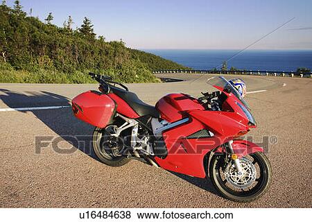 View of Motorcycle, Cabot Trail and Gulf of St. Lawrence, Cape Breton Highlands National Park, Nova Scotia, Canada View Large Photo Image Stock Photo - View of Motorcycle, Cabot Trail and Gulf of St. Lawrence, Cape Breton Highlands National Park, Nova Scotia, Canada. Fotosearch