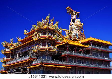 Stock Image - The majestic temple with statue on top, Penghu, Taiwan. Fotosearch
