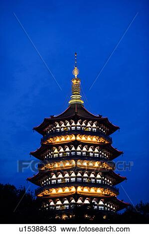 Stock Image - Leifeng Pagoda at night in Hangzhou, Zhejiang Province. Fotosearch