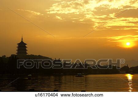 Leifeng Pagoda in Evening Glow in Hangzhou, Zhejing Province View Large Photo Image Picture - Leifeng Pagoda in Evening Glow in Hangzhou, Zhejing Province. Fotosearch